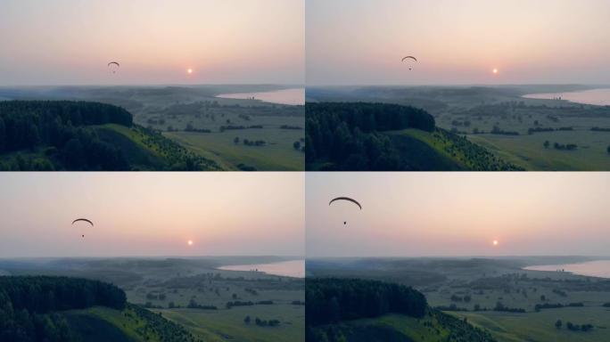 太阳落山时，Ram-air降落伞在天空中漂流