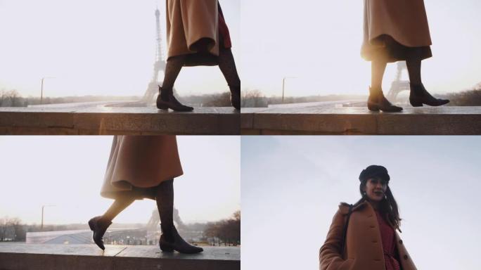 美丽快乐的旅游女人走路的双腿上的电影动作，在巴黎浪漫的埃菲尔铁塔上微笑慢动作。