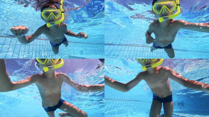 小孩在游泳池里学习游泳时戴着口罩。水下镜头。
