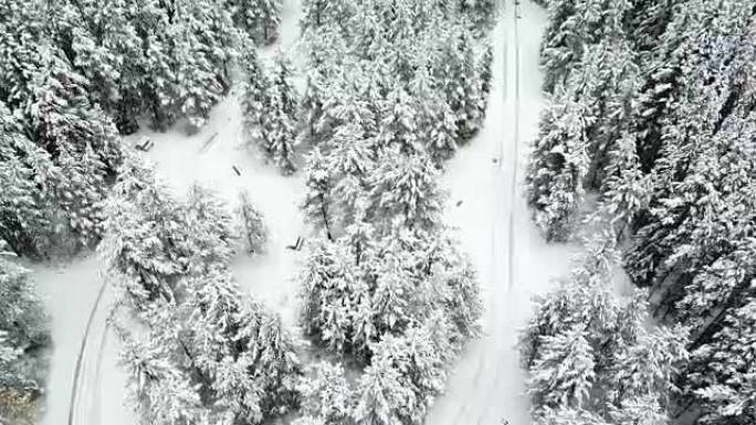 冬季道路的航拍雪景冰雪覆盖林海雪原