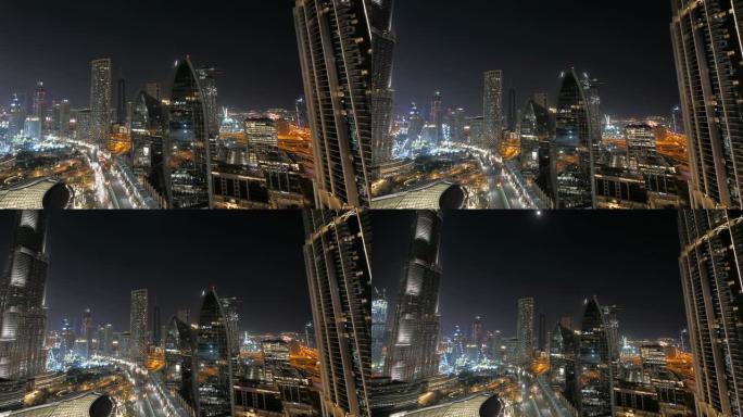 夜间在城市街道上拍摄现代大都市的延时航拍
