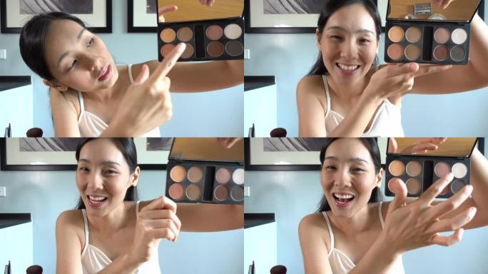 亚洲年轻女性博客作者在家录制带化妆化妆品的Vlog视频在线影响者