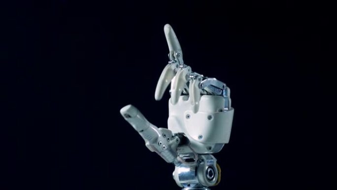 白色假手工作。未来主义半机械人手臂概念。