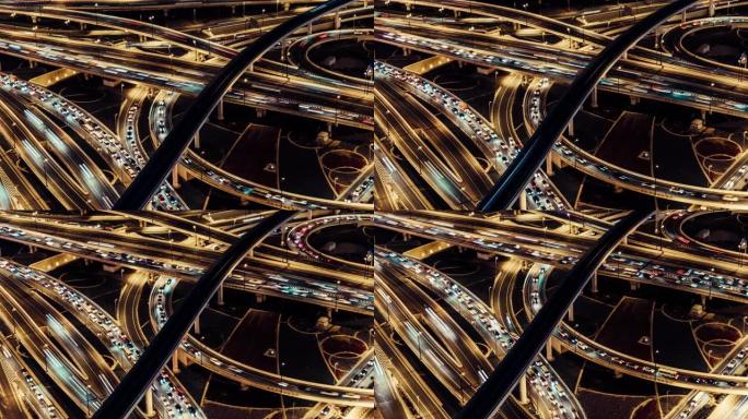 阿联酋迪拜夜间立交桥和城市交通的T/L TD鸟瞰图