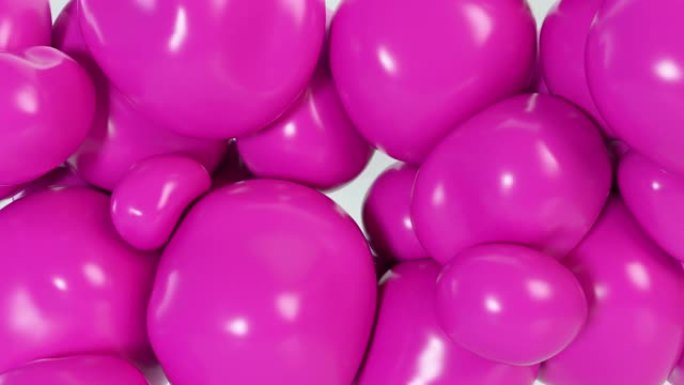抽象五颜六色的粉红色软球在内部压力下移动并相互作用，试图为自己找到一个地方。