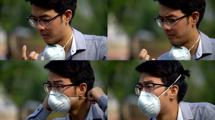 亚洲男子因泰国清迈空气污染严重而鼻子