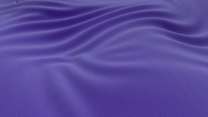 美丽的紫色面料在风中。在织物表面骑上漂亮的小玻璃球。