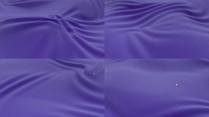 美丽的紫色面料在风中。在织物表面骑上漂亮的小玻璃球。