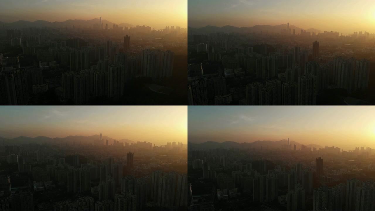 在日落时间向前移动并向上倾斜香港摩天大楼。