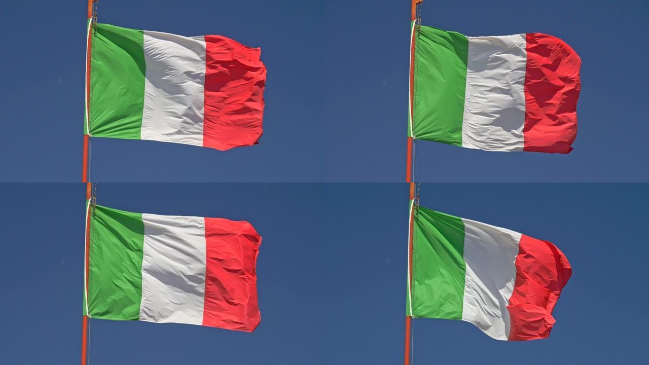 慢动作特写拍摄意大利国旗在风中挥舞。背景中的蓝天