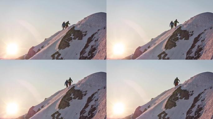 徒步旅行者在白雪皑皑的山脊上行走