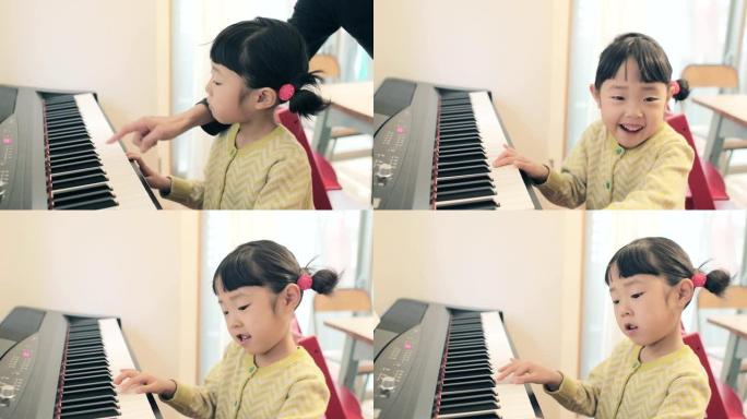一个日本人练习钢琴的孩子