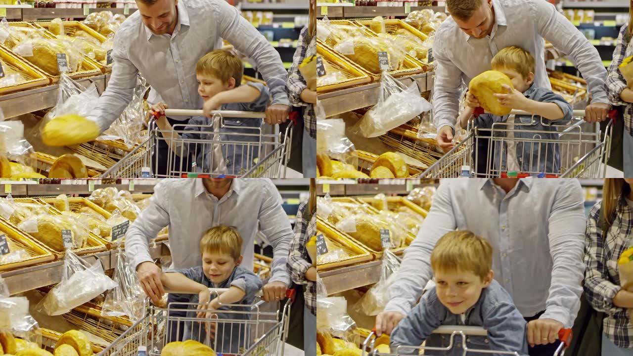 父母和儿子在超市买面包