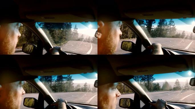 优胜美地大胡子男子驾驶汽车沿着林道拍摄的美丽特写镜头，聚焦侧镜慢动作。