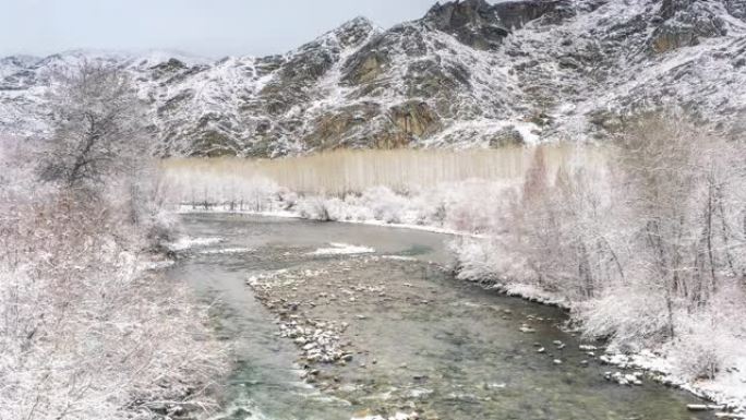 新疆鸟瞰图北国风光雪山航拍冰雪溪水