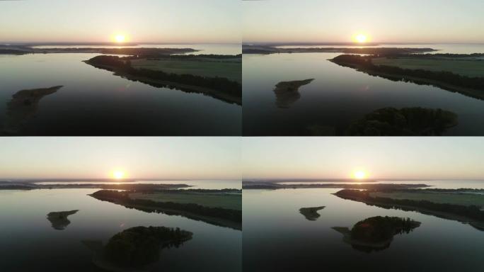 日落反射。蜿蜒湖海岸线的鸟瞰图