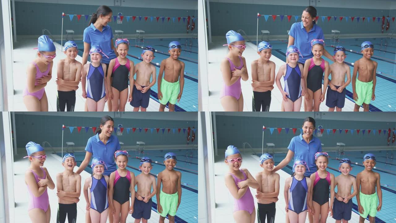 与女教练一起站在游泳池边缘的儿童肖像
