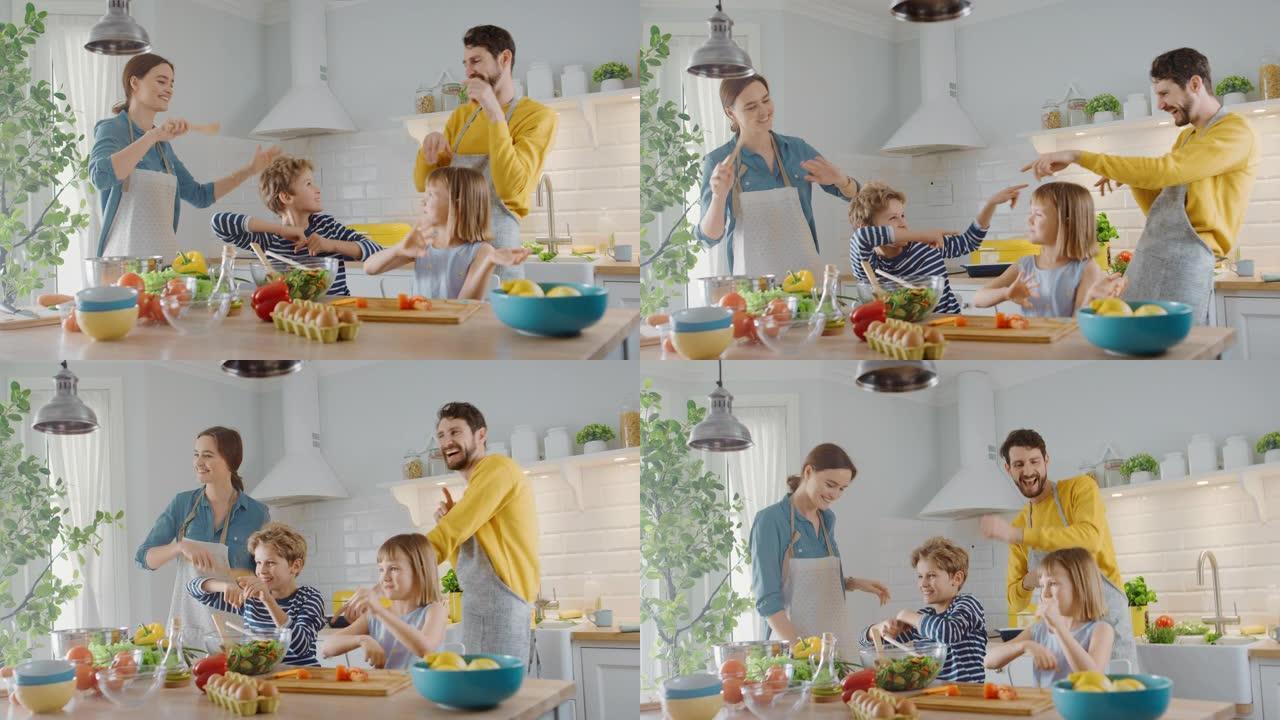 厨房: 四口之家一起烹饪健康晚餐。母亲，父亲，小男孩和女孩，准备沙拉，洗菜和切菜。可爱的孩子帮助他们