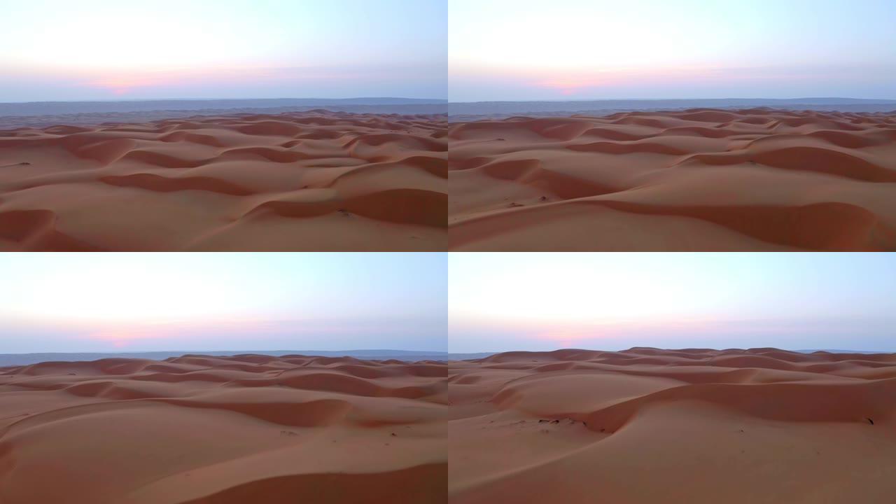 黎明时分在阿曼的沙漠中飞航