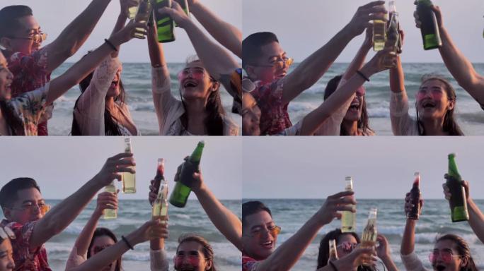 一群朋友在海滩上玩得开心，喝酒。慢动作。假期概念。假期-iStock