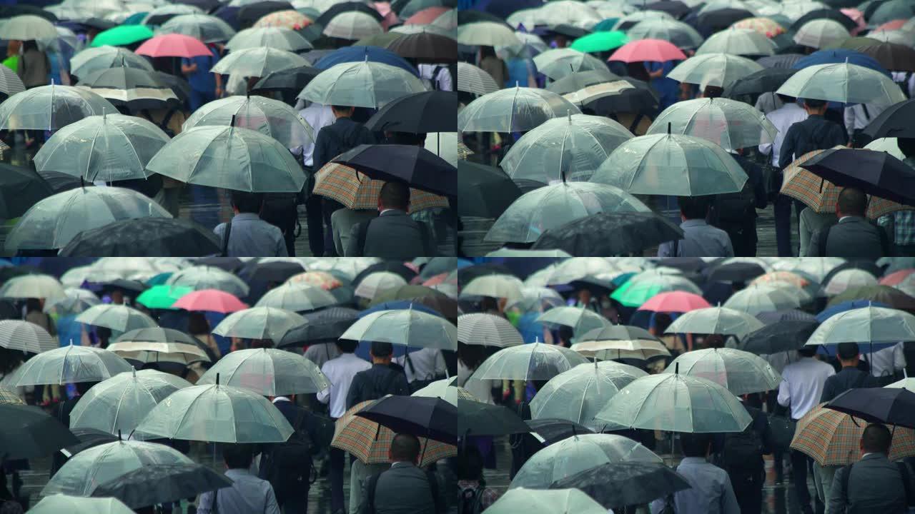 日本商人上午上班打伞下雨天