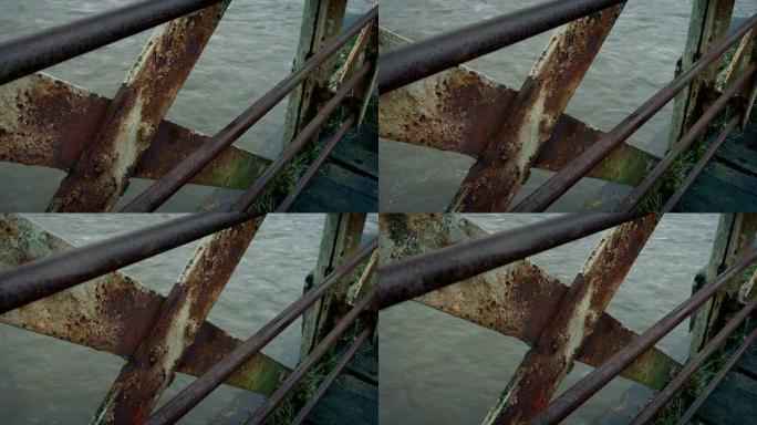 下面有河的生锈老桥的细节