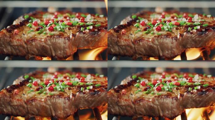 在高火焰下烹饪的烧烤烤架上肉的特写镜头。