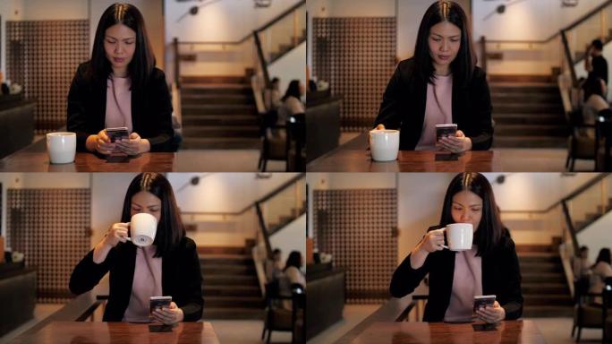 女商人在咖啡馆用手机打电话，喝咖啡，慢动作