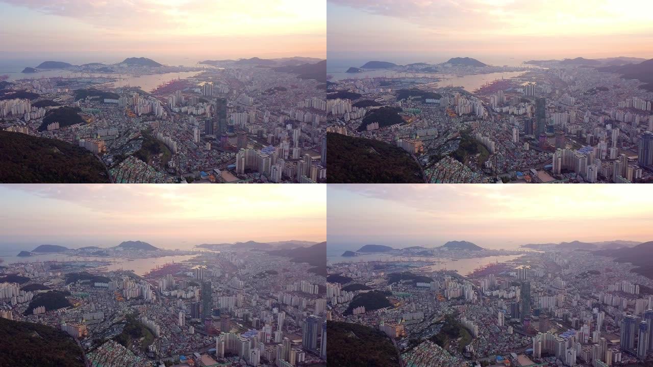 韩国釜山市城市景观的鸟瞰图日落