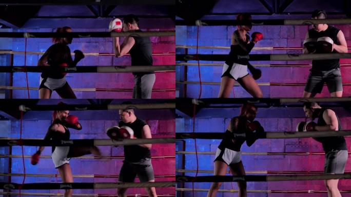 一名女拳击手在拳击场内拳打脚踢的特写镜头。女性接受拳击训练。运动教练