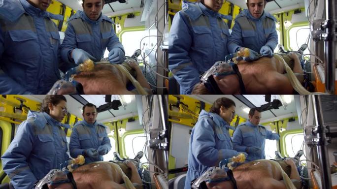 急救人员在救护车中治疗病人的手持镜头