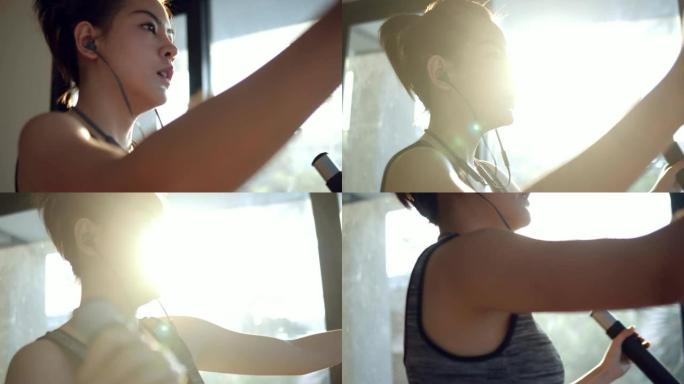 迷人的亚洲女性在健身房接受训练