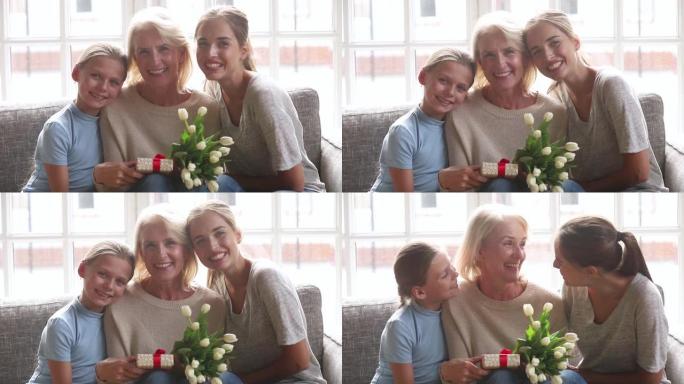 年轻的妈妈和小女儿祝贺老奶奶生日