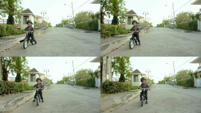骑自行车的小男孩小男孩学自行车