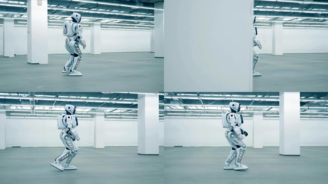 高大的人类机器人正沿着一个空的仓库单元行走