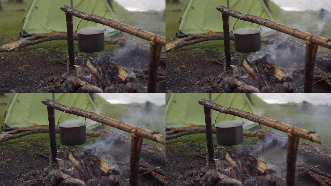 在雨中用火做饭在雨中用火做饭野餐野外