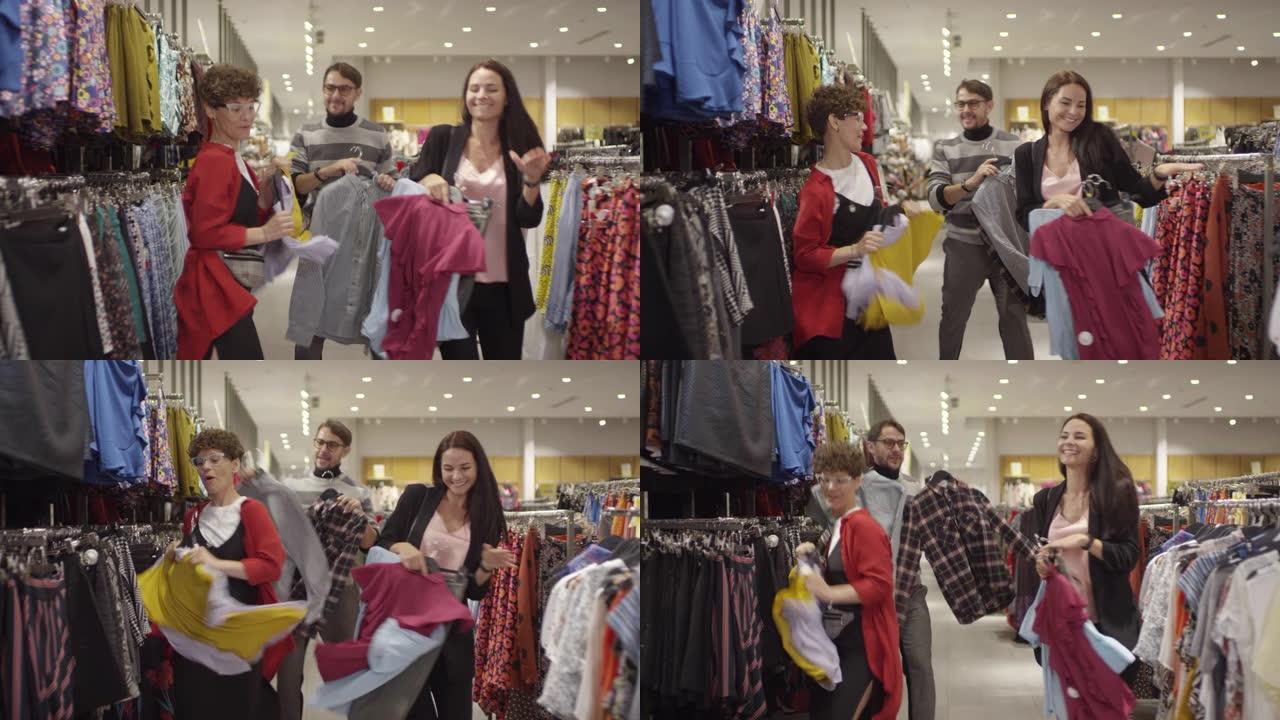 快乐的人们在服装店购物时跳舞