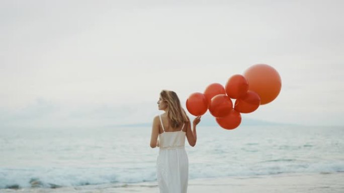 一个漂亮女人带着红色气球飘走