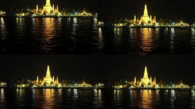 向上倾斜:Wat Arun Temple (Temple of Dawn)在晚上时间，曼谷，泰国。