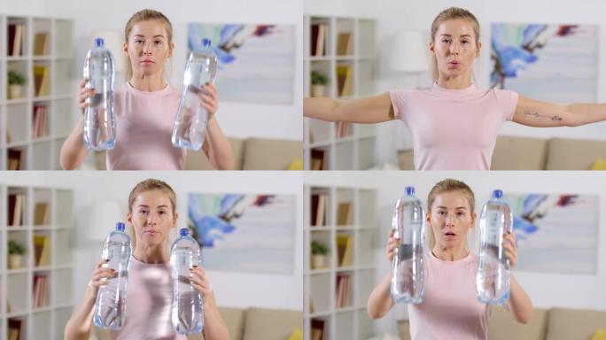 女人用水瓶锻炼身体，看着相机
