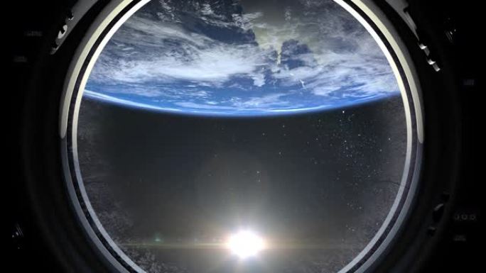 通过宇宙飞船的大舷窗看到地球。国际空间站正在绕地球运行。现实的氛围。3D体积云。空间。国际空间站。4
