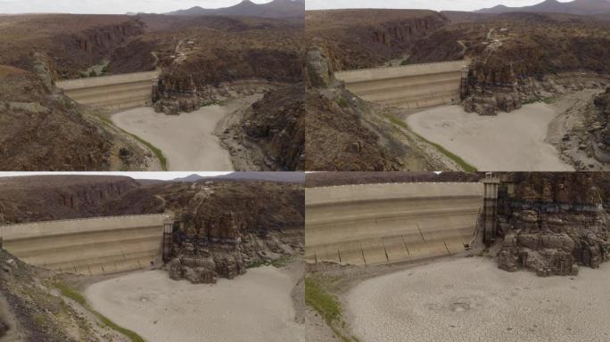 4k空中放大到由于气候变化和全球变暖造成的干旱而干dried的大型大坝的坝壁