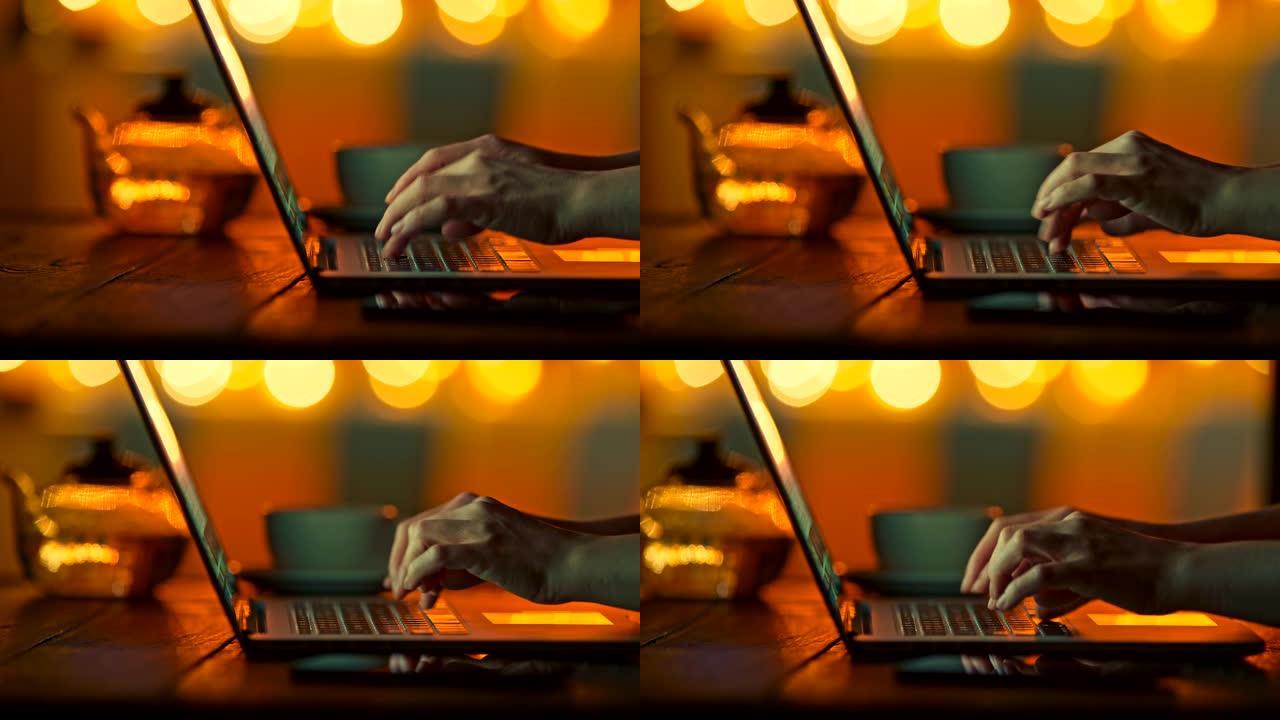 在半标记温暖的环境中，女性手指在笔记本电脑上打字。明亮的黄色圆形bokeh背景。滑动镜头，4K