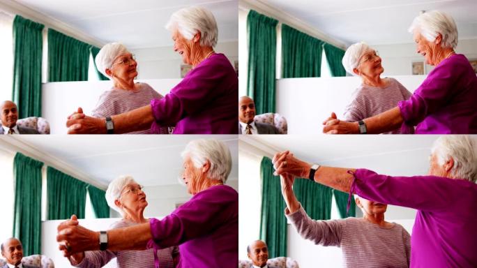 活跃的高加索女性老年女性在疗养院4k一起跳舞的侧视图