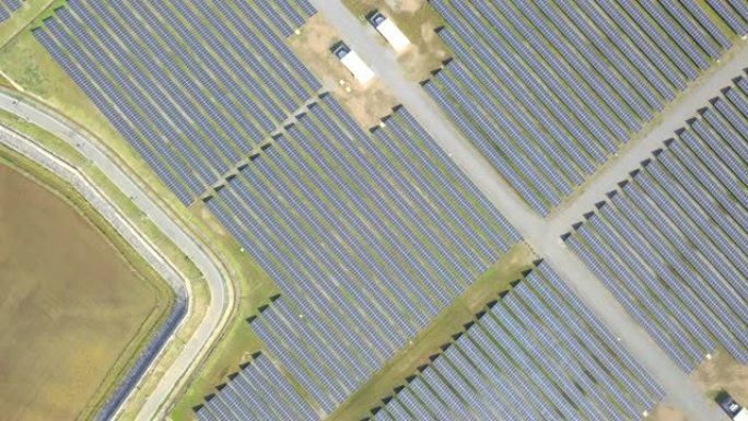 太阳能电池鸟瞰图飞越大型太阳能农场清洁可再生能源