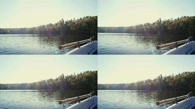 湖上的船。秋季日落视点