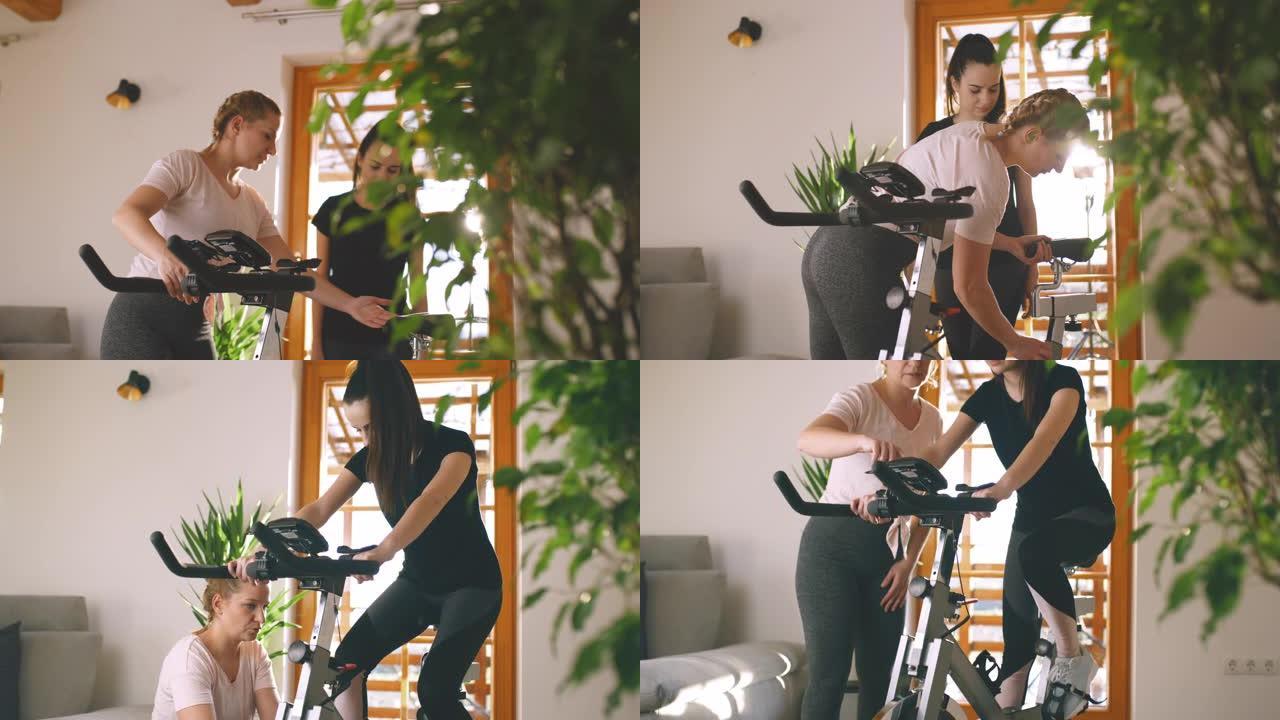 SLO MO教练协助一名女子骑健身车