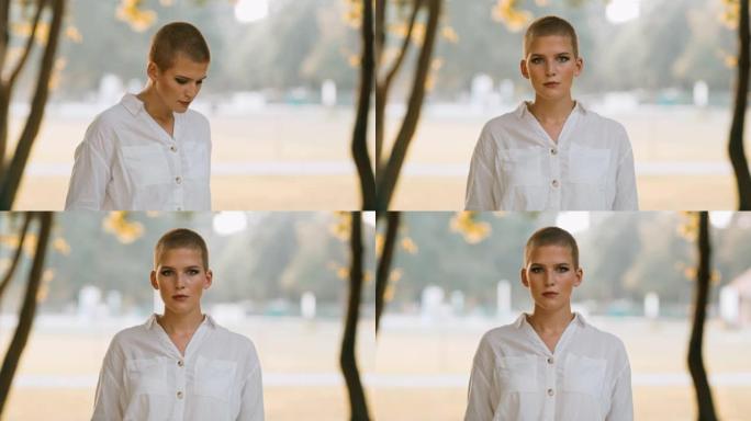 一名年轻女子看起来严肃的DS肖像