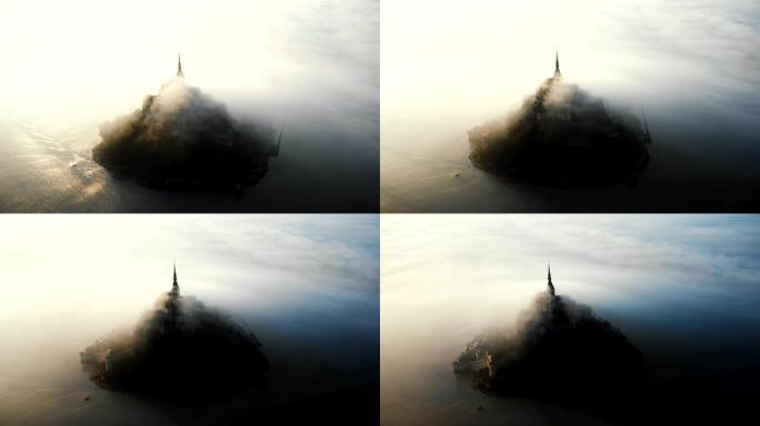 高潮日出时圣米歇尔山的史诗航拍，诺曼底被阳光普照的古岛城堡覆盖。