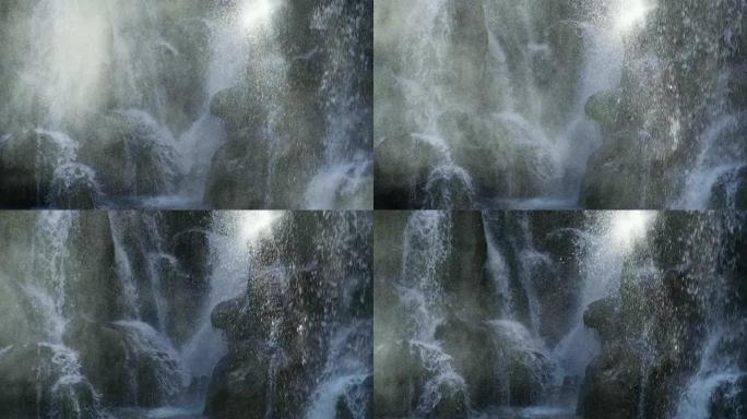 4K，中国蓝月谷国家公园瀑布飞溅的喷雾。